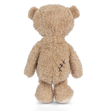 Load image into Gallery viewer, Back of a light brown teddy bear with a stitch on its back, on a white background.