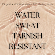 Load image into Gallery viewer, Graphic with water rippled beige background displaying text that reads "18K gold * stainless steel * 925 sterling silver " across the top and "Water * Sweat * Tarnish Resistant" in bold black letters in the center.