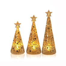 Load image into Gallery viewer, Set of three gold glitter cone trees with star toppers in varying heights, each illuminated from within by twinkling LED lights, displayed against a white background.