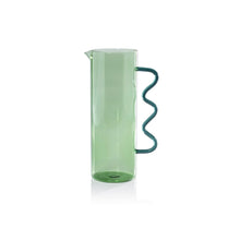Load image into Gallery viewer, Green glass pitcher with wavy handle on white background
