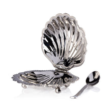 Load image into Gallery viewer, Polished nickel fan shell lidded bowl displayed open with the coordinating spoon placed alongside, displayed against a white background.