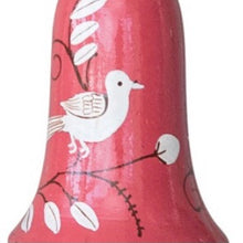 Load image into Gallery viewer, Salmon-colored wooden bell ornament with a white bird and botanical design, shown close up against a white background. 