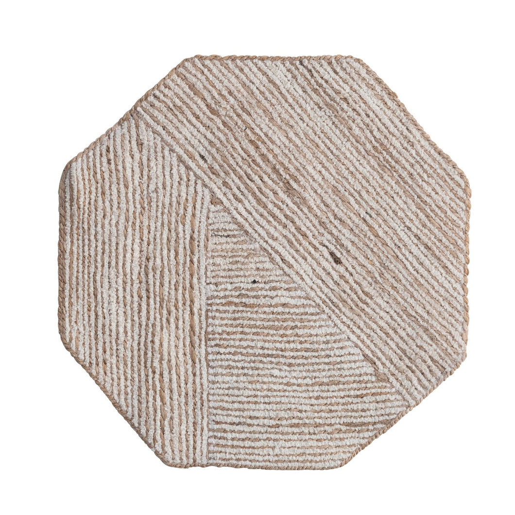 Hexagonal cotton jute placemat on a white background.