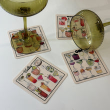 Load image into Gallery viewer, Set of four square cocktail coasters with colorfully illustrated mixed drinks, displayed on a white background with green-tinted stemware. 