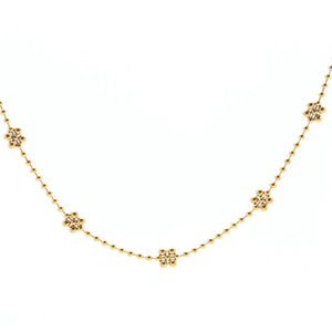 Golden Daisy Necklace available at Bench Home