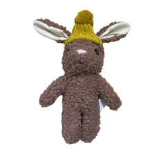Load image into Gallery viewer, Brown wool and cotton plush bunny rabbit with long cream-lined ears and a mustard yellow knit hat with a pom-pom, displayed against a white background.  