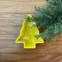 Load image into Gallery viewer, Yellow stoneware tree-shaped bowl displayed on a wooden surface with greenery on the right side. 