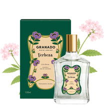 Load image into Gallery viewer, Granado Verbena cologne in clear glass bottle with gold cap and decorative label featuring purple flowers, displayed beside matching green Verbena box with purple flower illustration against a white background with pink flowers. 