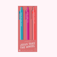 Load image into Gallery viewer, Pack of three &quot;Jesus Take The Wheel&quot; Jotter gel pens in teal, hot pink, and coral packaged in a pink sleeve with white text, displayed against a white background. 
