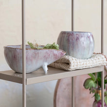 Load image into Gallery viewer, Two ceramic glazed bowls on a shelf with a textured cream blanket and plant in the background.