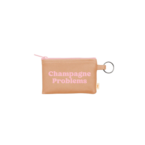 Beige vegan leather pouch with a pink zipper and a silver key ring, printed with the phrase 