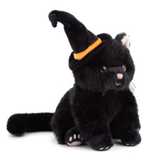 Load image into Gallery viewer, Black plush cat wearing a black witch hat with an orange band, with a tan nose, brown eyes, black whiskers, white paws, and white ears. Displayed against a white background. 