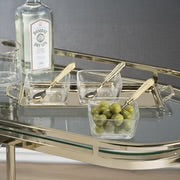 Load image into Gallery viewer, Rectangular metal condiment tray with two clear glass bowls and matching spoons, displayed on a glass bar cart with a gold metal frame. A third glass bowl filled with green olives and a matching spoon in front of the tray. A bottle of Bombay Sapphire gin is behind the tray, and a clear glass is next to the tray. Bar cart is against a gray background, and on a light brown surface.    