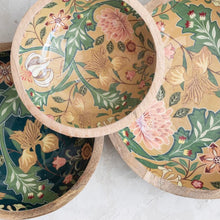 Load image into Gallery viewer, Three stacked enamel bowls with decorative floral patterns on a white background. Two larger bowls on the bottom . One with a dark green , yellow, and light green floral patterns , other in beige, green, and pink floral patterns. Smaller bowl on top of the two larger bowls. Smaller bowl is beige, green, and pink floral pattern.