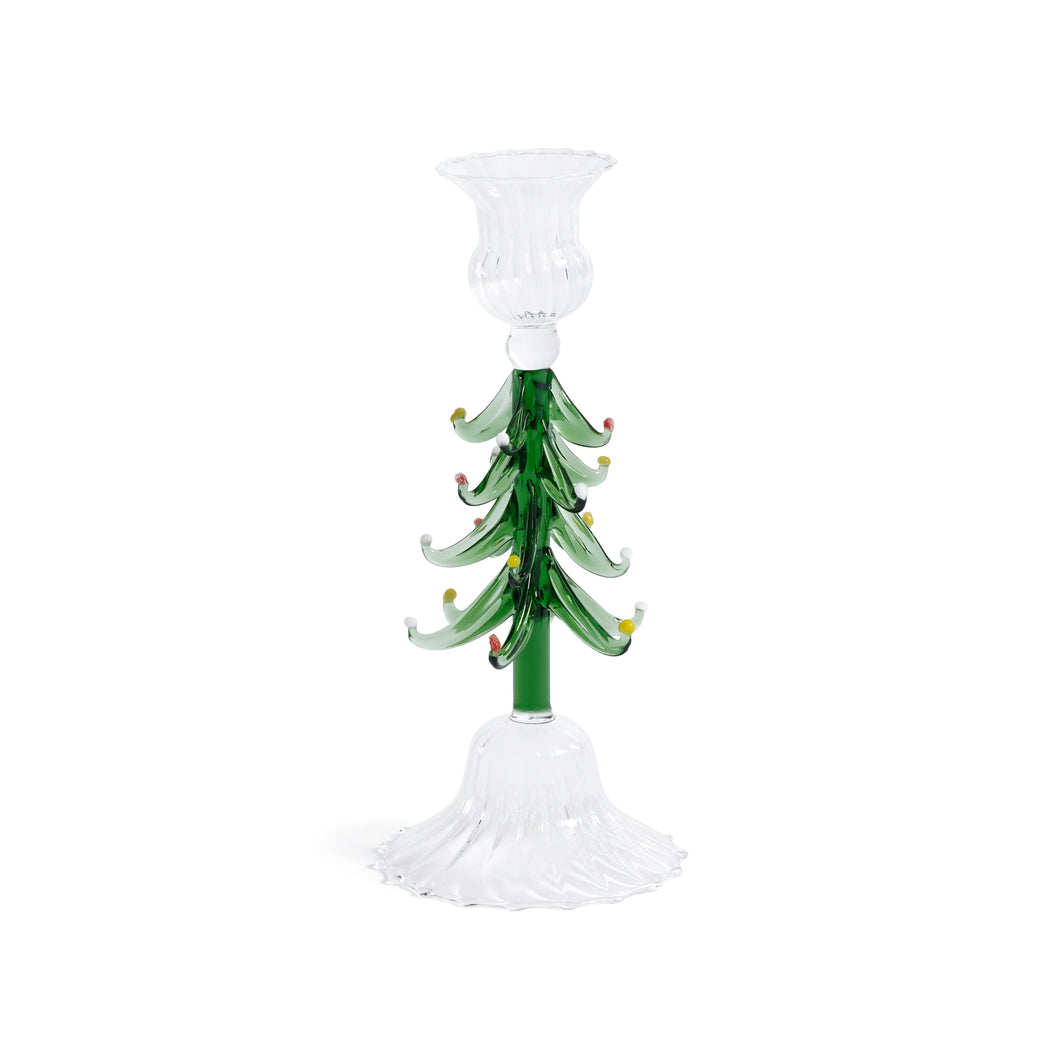 Single clear and green glass taper candle holder shaped like a Christmas tree with layered curled glass branches and tiny red and yellow accents, displayed against a white background. 