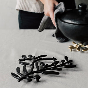 Metal Trivet Branch available at Bench Home