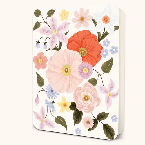 White greeting card featuring a detailed floral illustration with coral, pink, lavender, yellow, and white blossoms with green leaves displayed on a white background. 