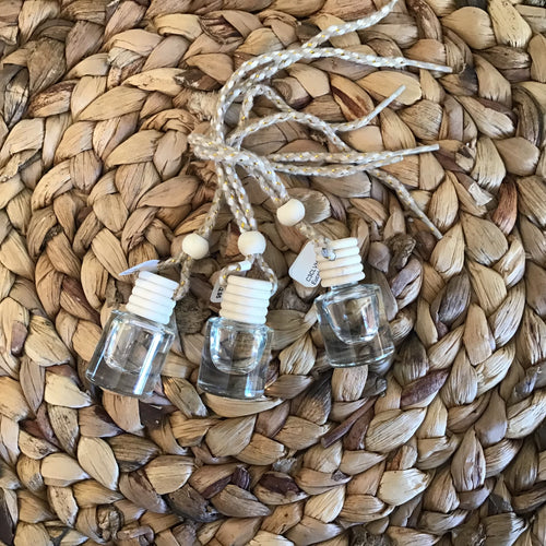 car diffuser with glass bottle and wood cap