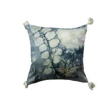 Load image into Gallery viewer, Blue Velvet Pillow, cotton velvet pillow with abstract blue-toned design, faded white botanical pattern, white tassels at each corner, displayed against white background. 