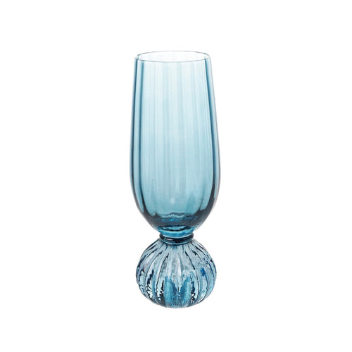 Blue pleated champagne glass with a rounded bottom. On a white background.