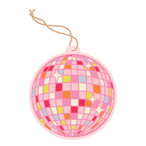 Round pink air freshener shaped like a disco ball with a red, orange, yellow, and blue checkered pattern and white star highlights, hanging from a cream-colored string against a black and gray background. 