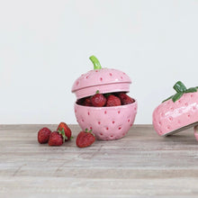 Load image into Gallery viewer, Pink strawberry-shaped container holding strawberries on a wooden surface