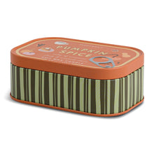 Load image into Gallery viewer, Side view of a Paddywax Pumpkin Spice tin candle. The top is orange colored and the body is brown and green vertical striped with an orange border. 
&quot;PUMPKIN SPICE&quot; yellow lettering on the top is visible from the side view. On a white background. 