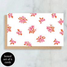 Load image into Gallery viewer, Mini greeting card with a white background and a pink floral cluster patten, shown on top of a brown kraft paper envelope.