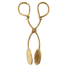 Load image into Gallery viewer, A pair of brass tongs with leaf patterns on the tongs, on a white background.