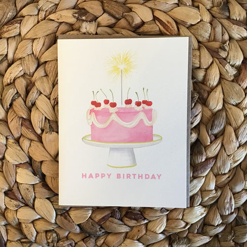 birthday cake with pink cake and sparklers and white background 