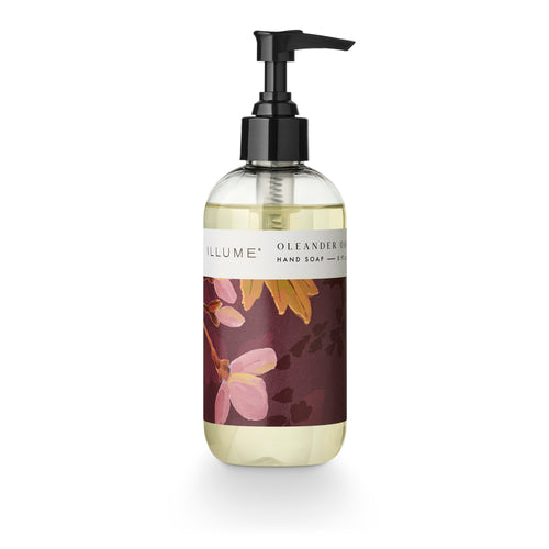Hand soap pump bottle with a purple floral design label on a white background