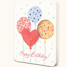 Load image into Gallery viewer, A slightly opened white greeting card with four colorful balloons, pink and blue confetti, and &quot;Happy Birthday!&quot; text in red.
One pink heart with yellow dots balloon, one yellow confetti balloon, one pink balloon with orange and white cheetah print, and a blue with black dots balloon. Against a white background. 