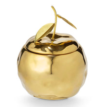 Load image into Gallery viewer, Gilded ceramic citrus-shaped candle with a removable lid and gold stem and leaves, displayed against a white background. 