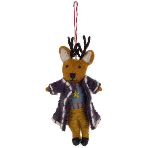 Handmade brown felt reindeer ornament wearing a dark purple jacket with white stitching, tan pants, and a blue sweater with a yellow flower and red stitching, The reindeer has dark antlers, tan fur and a red-and-white hanging loop, displayed against a white background. 