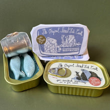 Load image into Gallery viewer, Three candles that resemble Herring in a tin can. 