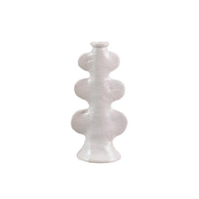 Load image into Gallery viewer, White ceramic taper candle holder  with an embossed design on a white background.