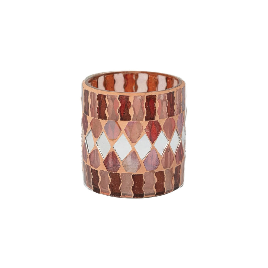 Glass votive candle holder featuring a pattern of red, pink, and white diamond tiles bordered by wavy mosaic stripes in red and pink, displayed on a white background. 