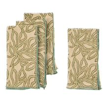 Load image into Gallery viewer, Four block print napkins with a leafy pattern and green stitched edges, displayed on a white background. 