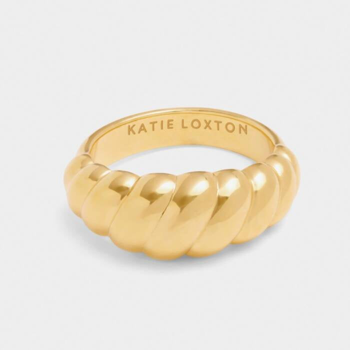 A gold band ring with a twisted rope design, and 