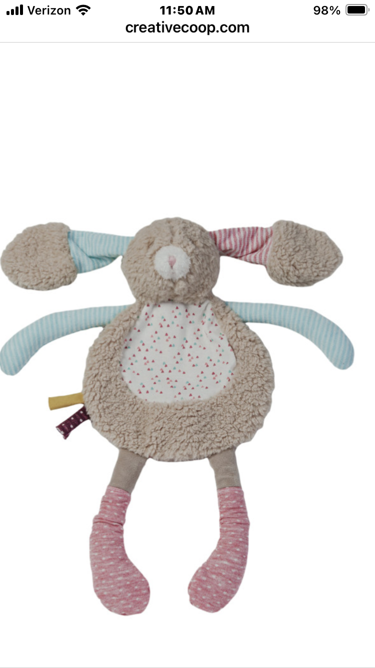 Plush toy with bunny ears and pink feet on a white background