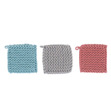 Load image into Gallery viewer, Three square shaped crochet potholders lined up in order : blue, gray, pink. On a white background. Potholders have a hanging loop in upper left corner.