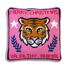 Load image into Gallery viewer, Pink needlepoint pillow with an orange tiger face featuring yellow eyes and a pink nose, white stars, and navy botanical motifs, with &quot;Merry Christmas&quot; along the top and &quot;Ya Filthy Animal&quot; along the bottom in red, displayed against a white background.  