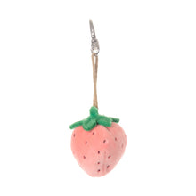 Load image into Gallery viewer, Blush pink strawberry plush bag charm with green leaves, dark seed details, tan cord, and silver clip, displayed on a white background. 