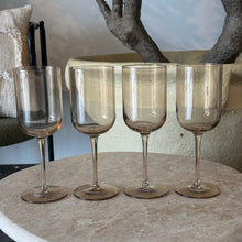 Load image into Gallery viewer, Four crystal red wine glasses in an organic color, displayed on a marble table.