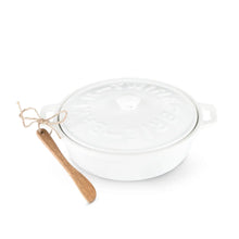 Load image into Gallery viewer, White stoneware brie baker with matching lid and a wooden spreader accented with twine, displayed on a white background.  