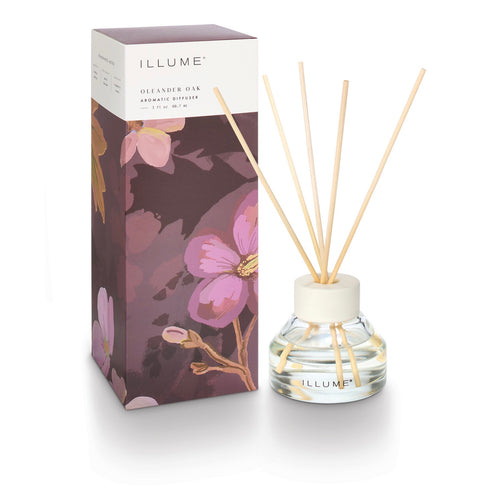 ILLUME diffuser with purple floral packaging on a white background