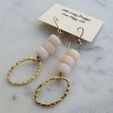 Load image into Gallery viewer, Pair of earrings with 3 stacked  pink beads and gold loops on a marble surface with a &quot;Abbe Long Designs San Diego,CA&quot; card.