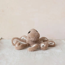 Load image into Gallery viewer, Plush octopus toy on a light surface with a neutral background