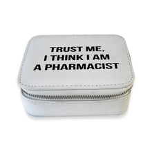 Load image into Gallery viewer, Light gray zippered travel pill box featuring the phrase "Trust Me, I Think I Am A Pharmacist" in black text, displayed on a white background.