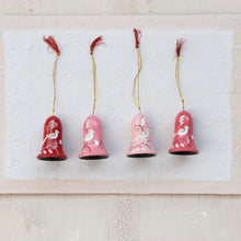 Load image into Gallery viewer, Four wooden bell ornaments in red, pink, light pink, and salmon with a white bird and botanical design, each topped with a gold hanging cord and a red tassel, displayed against a textured cream background. 